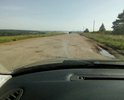 Дорога в неудовлетворительном состоянии после проведения некачественного ямочного ремонта.