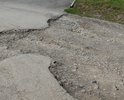 Данный участок дороги имеет множество очень глубоких ям, ремонта не было на ней очень давно