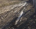 Деревня Угрюмово относится к Городскому округу Домодедово, деревня Сокольниково к Чеховскому. Между ними находятся земли сельхозназначения. По дороге, которая просто раскатывается грейдерами, можно проехать только при условии отсутствия дождя. Иногда нет возможности подъехать к дачам. Вопрос не решается, так как ни один из районов не хочет брать на баланс данный отрезок.