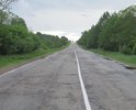Дорога под постоянными большегрузами вот-вот начнет сыпаться, надо бы подчинить