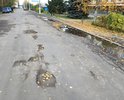 Дорога, ведущая к Районному дому Культуры в таком состоянии. Это позор.