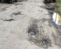 Дорога, ведущая к Районному дому Культуры в таком состоянии. Это позор.