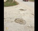 Разбитый участок дороги