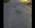 Многочисленные ямы , тротуаров, разметки нет. Асфальт местами треснутый , зиму не переживет.