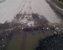Сильно разбита асфальтовая дорога . Создается угроза наезда на пешехода автомобилем т.к. ямы объезжают по обочинам дороги. Несколько лет ничего не предпринимается для ее ремонта , дыры не латаются и разрастаются еще больших размеров.