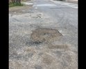 Огромная яма посередине дороги