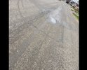 Люк и просевшая  дорога, фото не передает масштабы проседания