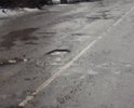 Ужасное состояние дороги улица Агрогородок. За все лето залепили несколько ям и бросили. На асфальте уже живого места нет, всё в заплатках, трещинах и ямах. Пора уже заменить асфальтовое покрытие.