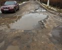 При подъезде к в/ч 02014, Калужской области, Боровского района, деревни Митяево- дороги нет, одни дыры!!! Машина черпает днищем все ямы...На сегодняшний день в связи с погодными условиями все ямы заполнены водой, непонятно какой глубины ямы!!!Дорога безобразна!