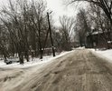 От ул.Менжинского до ул.Кравчинского асфальт разбили мусоровозы, которые свозили сюда весь городской мусор. Снимки сделаны зимой, когда немного укатали ямы, но весной, летом и осенью - острые края и глубина рытвин до 40 см. Если учесть, что рядом наша гордость - Георгиевский собор, то стоит заехать от него чуть дальше, то полная засада.