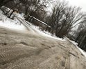 От ул.Менжинского до ул.Кравчинского асфальт разбили мусоровозы, которые свозили сюда весь городской мусор. Снимки сделаны зимой, когда немного укатали ямы, но весной, летом и осенью - острые края и глубина рытвин до 40 см. Если учесть, что рядом наша гордость - Георгиевский собор, то стоит заехать от него чуть дальше, то полная засада.