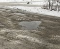 От ул.Менжинского до ул.Кравчинского асфальт разбили мусоровозы, которые свозили сюда весь городской мусор. Снимки сделаны зимой, когда немного укатали ямы, но весной, летом и осенью - острые края и глубина рытвин до 40 см. Если учесть, что рядом наша гордость - Георгиевский собор, то стоит заехать от него чуть дальше, то полная засада.
