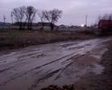 Проблема заключается в неудовлетворительном состоянии дорожного покрытия по ул. Крестьянская и ул. Ейская, после появления песчаного карьера постоянное движение большегрузной техники ухудшает и без того плачевное состояние, в сухую погоду облака пыли создают песчаную бурю. В дождливую погоду дороги превращаются в сплошное месиво.  Эти улицы становятся недоступными для всех видов легкового транспорта, не обеспечены подъездом скорой медицинской помощи, пожарной техники, милиции, нет возможности осуществить перевозку детей в детский сад №20, МОУ СОШ №6, а также к единственному продуктовому магазину в округе. В составе постоянных жителей ДНТ «Луч» и поселка «Койсуг» пенсионеры, родители с грудными детьми, школьниками, аллергики. Дорогу невозможно перейти. Наши конституционные права нарушены!