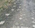 Пгт Приморский по адресу ул.  Десантников дома 7 и 9. При подъезде к данным домам со стороны завода "МОРЕ" дороги нет вообще, там всегда грязь и огромные лужи. К дому по адресу Десантников 7 подойти вообще не возможно, жителям приходиться идти через двор дома № 9. Данная проблема по этим адресам актуальна уже очень много лет и решить ее никак не могут. Одно время пытались что-то сделать и насыпали щебенки, но это все ненадолго, хватило буквально на полгода. Огромные ямы на дороге, машины днищем цепляют дорогу.  Пожалуйста, решите данную проблему. После дождя, еще на протяжении нескольких дней стоит грязь и лужи.