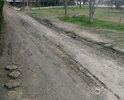 Пгт Приморский по адресу ул.  Десантников дома 7 и 9. При подъезде к данным домам со стороны завода "МОРЕ" дороги нет вообще, там всегда грязь и огромные лужи. К дому по адресу Десантников 7 подойти вообще не возможно, жителям приходиться идти через двор дома № 9. Данная проблема по этим адресам актуальна уже очень много лет и решить ее никак не могут. Одно время пытались что-то сделать и насыпали щебенки, но это все ненадолго, хватило буквально на полгода. Огромные ямы на дороге, машины днищем цепляют дорогу.  Пожалуйста, решите данную проблему. После дождя, еще на протяжении нескольких дней стоит грязь и лужи.