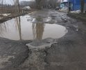 Добрый день!
К вам обращаются жители г. Аксая!

  В г. Аксае есть всеми известный проспект Ленина!
Но вот его часть полностью разрушена, уже если честно, не то что бы проспектом, а просто сельской или деревенской дорогой её тяжело назвать,
она в очень ужасном состоянии. на ней нет "живого места" - характеризующую её как дорога!
  Находится этот участок на въезде в наш любимый г. Аксай с трассы М4 Дон, поворот прямо на против Стеллы (Аксай основан в 1570 году) -
(фото прилагается)
  Вот от самого поворота и начинается самое интересное, начинаются номера от 44 и далее 46,48,50,52.......сразу на повороте огромная яма (не раз уже на этом месте из застревания в ней машины случались Аварии) и
далее по всей дороги ОГРОМНЫЕ ямы , по которым не возможно проехать и пройти! Без слёз смотреть страшно.
  Машина когда пробирается по этой дороге, снизу сплошной скрежет стоит, колёса на шишках. а если едет машина с каким-либо товаром по ямам, то страшно что вот-вот и она перевернётся прямо на тебя!
  Не однократно наблюдаем картину и сами помогаем друг другу выкарабкиваться из этих ям тросами!
Одна пара обуви на месяц, приходится ехать на работу в самой ужасной обуви . которую не жалко, а потом переобувать в любое время года!
  Обувь ещё не самое страшное, а сколь раз наш трудящийся народ подворачивал ногу на этих ямах и падал, особенно в гололёд и слякоть!
Мы не просим много, а всего малую часть - залатать эти огромные ямы! покрыть дорогу хоть фалом.! Пожалуйста услышьте нас скорее!

Мы мучаемся уже более 5 лет. Но уже терпеть невозможно! Ведь последний раз 5 лет назад приезжала машина и латала въезд и всю эту дорогу.

Очень просим Вас отреагировать как можно скорее на наше письмо- нашу просьбу! о ПОДЛАТАТЬ эти огромные ямы!