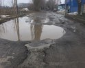 Добрый день!
К вам обращаются жители г. Аксая!

  В г. Аксае есть всеми известный проспект Ленина!
Но вот его часть полностью разрушена, уже если честно, не то что бы проспектом, а просто сельской или деревенской дорогой её тяжело назвать,
она в очень ужасном состоянии. на ней нет "живого места" - характеризующую её как дорога!
  Находится этот участок на въезде в наш любимый г. Аксай с трассы М4 Дон, поворот прямо на против Стеллы (Аксай основан в 1570 году) -
(фото прилагается)
  Вот от самого поворота и начинается самое интересное, начинаются номера от 44 и далее 46,48,50,52.......сразу на повороте огромная яма (не раз уже на этом месте из застревания в ней машины случались Аварии) и
далее по всей дороги ОГРОМНЫЕ ямы , по которым не возможно проехать и пройти! Без слёз смотреть страшно.
  Машина когда пробирается по этой дороге, снизу сплошной скрежет стоит, колёса на шишках. а если едет машина с каким-либо товаром по ямам, то страшно что вот-вот и она перевернётся прямо на тебя!
  Не однократно наблюдаем картину и сами помогаем друг другу выкарабкиваться из этих ям тросами!
Одна пара обуви на месяц, приходится ехать на работу в самой ужасной обуви . которую не жалко, а потом переобувать в любое время года!
  Обувь ещё не самое страшное, а сколь раз наш трудящийся народ подворачивал ногу на этих ямах и падал, особенно в гололёд и слякоть!
Мы не просим много, а всего малую часть - залатать эти огромные ямы! покрыть дорогу хоть фалом.! Пожалуйста услышьте нас скорее!

Мы мучаемся уже более 5 лет. Но уже терпеть невозможно! Ведь последний раз 5 лет назад приезжала машина и латала въезд и всю эту дорогу.

Очень просим Вас отреагировать как можно скорее на наше письмо- нашу просьбу! о ПОДЛАТАТЬ эти огромные ямы!