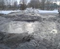 Дорогу не ремонтировали как построили 9-этажку...