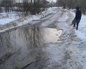 Дорогу не ремонтировали как построили 9-этажку...