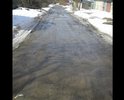 Этот участок дороги ведет к "жемчужине" нашего города - пляжу городского озера. Так вот, пока к нему (пляжу) идешь все ноги переломаешь да и толком не проедешь.
Многочисленные глубокие ямы, от асфальта остались лишь небольшие напоминания, что он там был когда то.
Мы жильцы прилегающих улиц пытались как то восстановить дорожное покрытие (засыпали ямы щебенкой купленной за свои же кровные) но хватило лишь на короткое время, по весне Щебенку вымыло из ям.