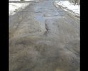 Этот участок дороги ведет к "жемчужине" нашего города - пляжу городского озера. Так вот, пока к нему (пляжу) идешь все ноги переломаешь да и толком не проедешь.
Многочисленные глубокие ямы, от асфальта остались лишь небольшие напоминания, что он там был когда то.
Мы жильцы прилегающих улиц пытались как то восстановить дорожное покрытие (засыпали ямы щебенкой купленной за свои же кровные) но хватило лишь на короткое время, по весне Щебенку вымыло из ям.