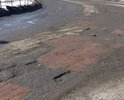 Убитая дорога , ямочный ремонт на этом участке дороги не помогает , каждый год его делают и ямы вновь появляются , и опять ремонт , и опять все разваливается .