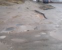 Этот участок не ремонтировался со времени постройки этой автодороги. два раза в год грейдером подравнивают, но это не решает проблему, через неделю все ямы вновь появляются на своих местах. Ямы глубиной более 15 см.