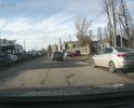Дорога около ТРЦ Ковров-молл, множество мелких ям и неровностей