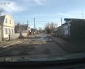 Безнадежно убитая дорога, даже щебенка городской администрации до нее не добралась