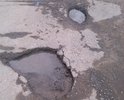 Разбитая лесовозами дорога.