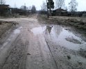 Сильное размытие дороги вблизи перекрёстка.
