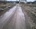 Размытие и разрушение дорожного полотна.