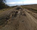 Дорога разбита в хлам. Грузовики сделали ее не проездной для легковушек.