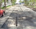Недоделанная дорога вдоль дома ул.Мечникова 45