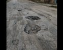 Заявление 
  
03.06.2018 мною на территории дороги по адресу: Республика Коми, г. Ухта, Бельгопское шоссе вбыли обнаружены множественные повреждения дорожного полотна, размеры которых превышают предельно допустимые значения в соответствии с требованиями ГОСТ Р 50597-93 «Автомобильные дороги и улицы. Требования к эксплуатационному состоянию, допустимому по условиям обеспечения безопасности дорожного движения». Данные повреждения представляют опасность для участников дорожного движения.
  	В пункте 1 ГОСТ Р 50597-93 указана его область применения. В эту область входят «все дороги и улицы городов и других населенных пунктов». При этом там же указано, что «категории улиц и дорог в городах и населенных пунктах определяются по СНиП 2.07.01.».
   	При этом в СНиП 2.07.01, в разделе 6, в таблице 7, указаны, среди прочих, следующие категории улиц и дорог в городах и населённых пунктах:
   	1. «Улицы в жилой застройке» - транспортная (без пропуска грузового и общественного транспорта) и пешеходная связи на территории жилых районов (микрорайонов), выходы на магистральные улицы и дороги регулируемого движения.
  	2. «Проезды» - подъезд транспортных средств к жилым и общественным зданиям, учреждениям, предприятиям и другим объектам городской застройки внутри районов, микрорайонов, кварталов.
  	Указанный в моём заявлении проезд во дворе дома 19а по ул.30 лет Октября предназначен для подъезда транспортных средств к жилому зданию, а следовательно, на него распространяются требования ГОСТ Р 50597-93.
  	В статье 36 Жилищного кодекса указано, что: «Границы и размер земельного участка, на котором расположен многоквартирный дом, определяются в соответствии с требованиями земельного законодательства и законодательства о градостроительной деятельности.»
  	Тогда как в пункте 12 статьи 85 Земельного кодекса указан прямой запрет на приватизацию земельных участков общего пользования, занятые площадями, улицами, проездами, автомобильными дорогами.
   	Согласно требованию статьи 6 Федерального Закона «Об автомобильных дорогах и дорожной деятельности», указанный мной участок дороги должен находится в собственности МОГО Ухта.
   	Статьей 1 ФЗ «О безопасности дорожного движения» в качестве задачи определена охрана жизни, здоровья и имущества граждан, защита их прав и законных интересов, общества и государства путем предупреждения дорожно-транспортных происшествий, снижения тяжести их последствий. Основные требования по обеспечению безопасности дорожного движения при содержании дорог определяются ст. 12 указанного закона, в соответствии с которой содержание дорог на территории РФ должно обеспечивать безопасность дорожного движения.
  	В соответствии с п.19 ч.1 ст.12 ФЗ «О полиции» на полицию возлагаются обязанность по осуществлению государственного контроля (надзора) за соблюдением правил, стандартов, технических норм и иных требований нормативных документов в области обеспечения безопасности дорожного движения. Максимальный срок, предусмотренный ГОСТ Р 50597-93 для исправления повреждений дорожного покрытия составляет 10 суток. В связи с изложенным, на основании п.11 Положения «О ГИБДД МВД РФ», ст. 12 ФЗ «О полиции», п.3 ч.1.ст. 28.1, ч.1 ст29.13 КоАП Российской Федерации прошу:
1)	Возбудить дело об административном правонарушении по статье 12.34 КоАП РФ «Несоблюдение требований по обеспечению безопасности дорожного движения при ремонте и содержании дорог, железнодорожных переездов или других дорожных сооружений» в отношении дорожной службы, ответственной за содержание и ремонт указанного дорожного участка.
2)	Выдать предписание о принятии мер по устранению указанных недостатков.
3)	По существу моего заявления и о принятых мерах сообщить мне письменно.