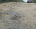 Автомобильная дорога, проходящая вдоль железной дороги от ж/д ст.Михайловская до подъезда к д.Славянка находится в ужасном состоянии. Эта дорога включена в перечень автомобильных дорог общего пользования Кировского муниципального района Ленинградской области в 2014 году. У Кировского района нет фактически средств на достойное содержание дороги.По этой дороге ежедневно ездят садоводы 18 СНТ и д.Славянка. Силами садоводов проводится грейдеровка и подсыпка щебнем, но это ничтожно мало и хватает до первого дождя. От лица всех садоводов просим помочь в ремонте этой дороги.