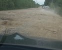 Автомобильная дорога, проходящая вдоль железной дороги от ж/д ст.Михайловская до подъезда к д.Славянка находится в ужасном состоянии. Эта дорога включена в перечень автомобильных дорог общего пользования Кировского муниципального района Ленинградской области в 2014 году. У Кировского района нет фактически средств на достойное содержание дороги.По этой дороге ежедневно ездят садоводы 18 СНТ и д.Славянка. Силами садоводов проводится грейдеровка и подсыпка щебнем, но это ничтожно мало и хватает до первого дождя. От лица всех садоводов просим помочь в ремонте этой дороги.