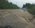 Автомобильная дорога, проходящая вдоль железной дороги от ж/д ст.Михайловская до подъезда к д.Славянка находится в ужасном состоянии. Эта дорога включена в перечень автомобильных дорог общего пользования Кировского муниципального района Ленинградской области в 2014 году. У Кировского района нет фактически средств на достойное содержание дороги.По этой дороге ежедневно ездят садоводы 18 СНТ и д.Славянка. Силами садоводов проводится грейдеровка и подсыпка щебнем, но это ничтожно мало и хватает до первого дождя. От лица всех садоводов просим помочь в ремонте этой дороги.