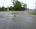 Примыкание ул. Автодорожной к ул. Минской в ямах и промоинах . Просим отремонтировать данный участок дороги.