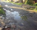 Плывуны и канавы на дороге, постоянная проблема. Не успеваем ремонтировать машины.
