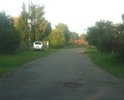 Дорога от деревни Коробовщина по деревню Берёзовая роща, дорога сделана разными кусками есть нормальные куски дороги по 30-50м., а далее дырки в прошлом году проводили ремонт, так просто насыпвли мелового грави и через месяц снова дырки на дороге. В этом году сразу за деревней берёзовая роща положили асфальт новенький метров 50-70, а по деревне зачем класть асфальт. А на границе Березовая роща/Коробовщина вообще асфальта нет насыпали крошку , ну и та пошла ямами.