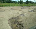 Дорога в ужасном состоянии. Даже ямочный ремонт не выполняется с 2014 года. Крайне небезопасна для движения автотранспорта. Единственная дорога до д. Юж-Толешево. По этой дороге ездит автобус и дети добираются в школу. Огромные ямы глубиной до 30см, а также вспученный асфальт высотой до 20 см. Полное отсутствие разметки.