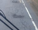 Дорога после съезда с нового Приозерского шоссе в сторону железнодорожной станции Грузино из-за увеличения потока машин превратилась в решето. Помогите!!