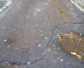 Придомовая дорога разбита, скорые подъехать к подъезду не могут. Дорога не включена в программу "Городская среда" (по мнению жителей).