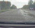 На въезде в Азово со стороны кольца, напротив АЗС Газпром дорога убитая.
