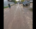 Дорога в ужасном состоянии. По этой дороге каждый день ходят дети в школу и родители с детьми с детские сады. Для пешеходов нет дорожки , а сама дорога состоит из ям.