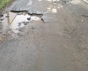 На фото представлено дорога без асфальтированного покрытия от Общежития №1( ул. Ломоносова 63) по улице Ломоносова до улицы Белинского