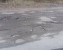 Дорога не соответствует ГОСТ. Сплошные ямы которые засыпают щебнем (это видимо у них своя нормативная документация по ремонту).