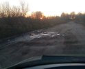Дорога в ужасном состоянии. Ямы. После дождя огромные лужы. Что самое интересное эта дорога ведет к местному асфальтному заводу.
