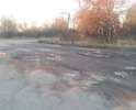 Дорога в ужасном состоянии. Ямы. После дождя огромные лужы. Что самое интересное эта дорога ведет к местному асфальтному заводу.